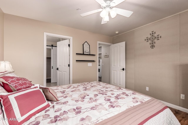 7247 W Buckskin Trl, Peoria, AZ 85383 - bedroom featuring wood finished floors and ceiling fan
