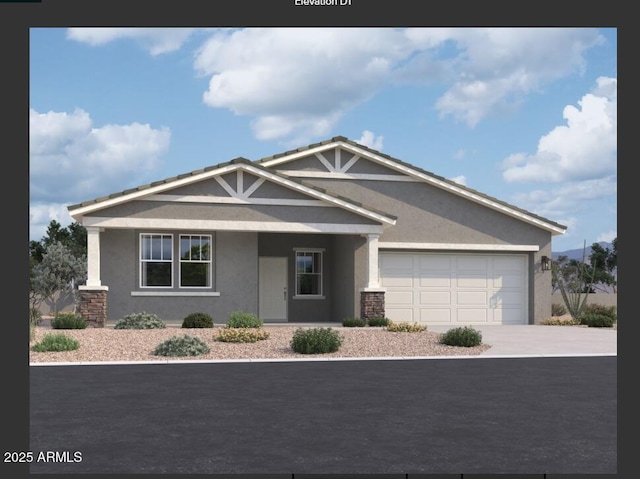 craftsman-style house with driveway, an attached garage, and stucco siding