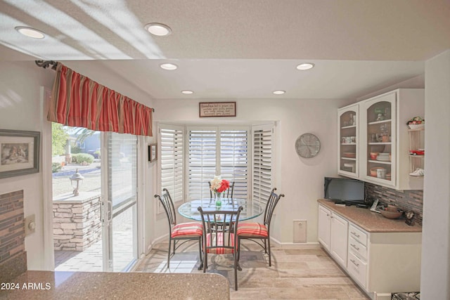 dining area with light wood-type flooring