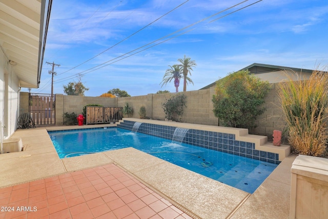 view of swimming pool featuring pool water feature