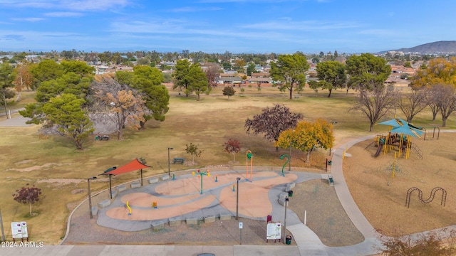 birds eye view of property featuring a mountain view