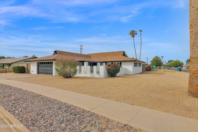 single story home with a garage