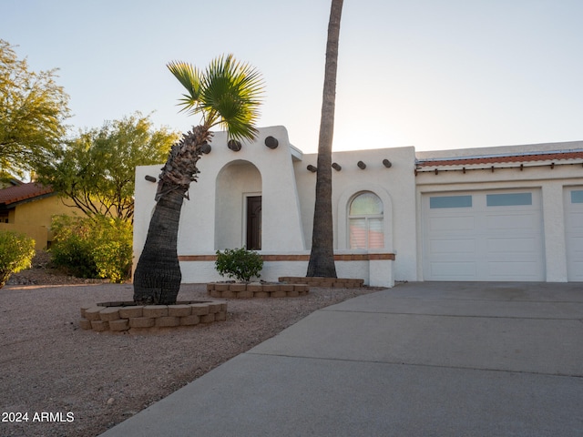 view of front of home featuring a garage