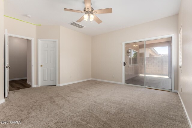 12238 W Monroe St, Avondale, AZ 85323 - unfurnished bedroom with carpet, access to exterior, baseboards, and a ceiling fan