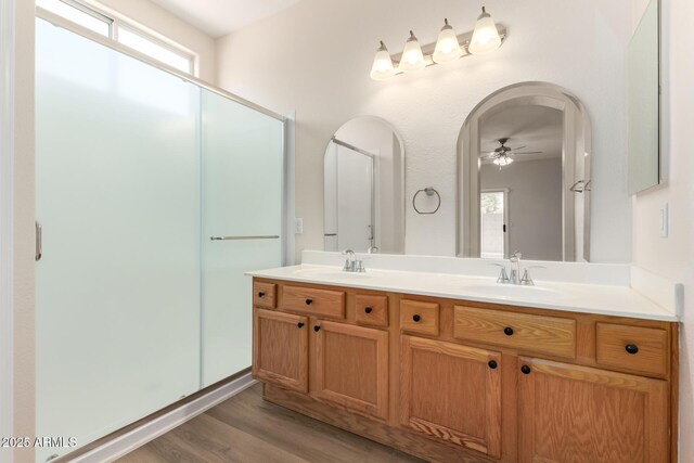 12238 W Monroe St, Avondale, AZ 85323 - full bathroom with wood finished floors, a ceiling fan, and double vanity