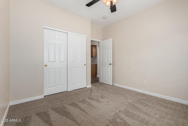 12238 W Monroe St, Avondale, AZ 85323 - unfurnished bedroom featuring carpet floors, a closet, baseboards, and ceiling fan