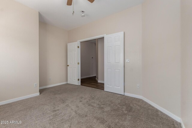 12238 W Monroe St, Avondale, AZ 85323 - unfurnished bedroom with carpet, baseboards, and a ceiling fan