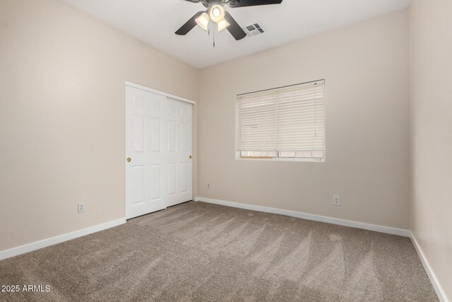 12238 W Monroe St, Avondale, AZ 85323 - unfurnished bedroom with carpet flooring, baseboards, and a closet
