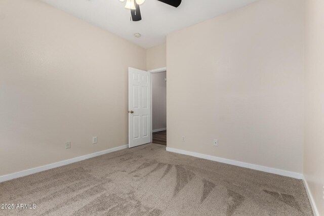 12238 W Monroe St, Avondale, AZ 85323 - carpeted empty room featuring ceiling fan and baseboards