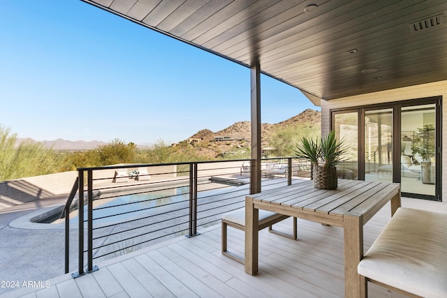 deck with a mountain view