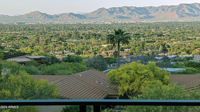 birds eye view of property with a mountain view