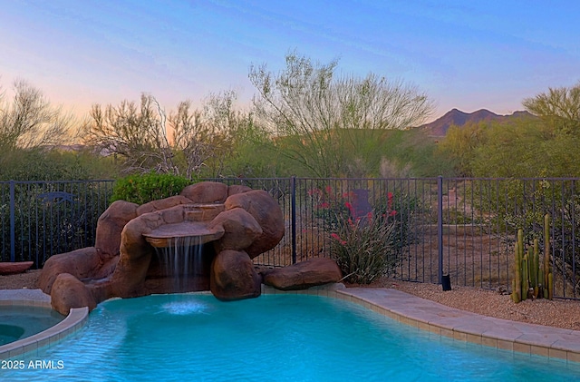 5520 E Desert Forest Trl, Cave Creek, AZ 85331 - view of swimming pool with a mountain view and a pool with connected hot tub