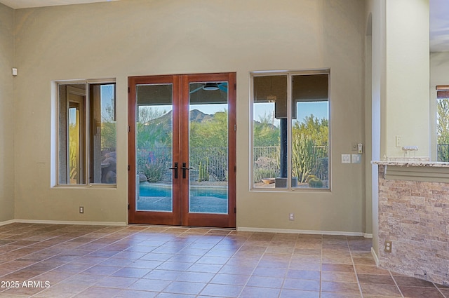 5520 E Desert Forest Trl, Cave Creek, AZ 85331 - doorway to outside featuring plenty of natural light, french doors, ceiling fan, and baseboards
