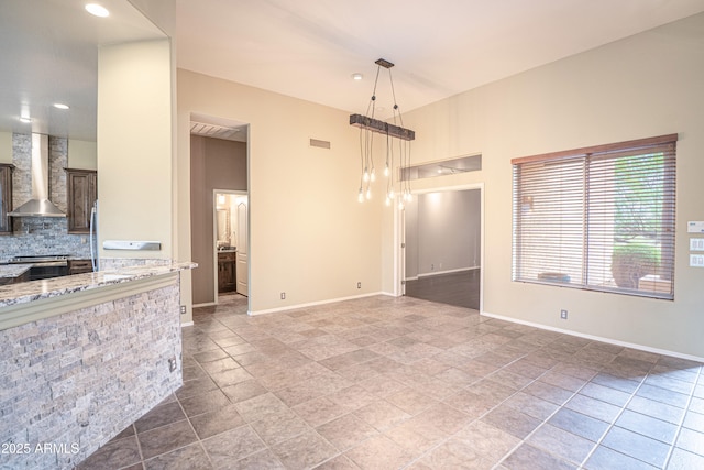 5520 E Desert Forest Trl, Cave Creek, AZ 85331 - unfurnished living room featuring baseboards and recessed lighting