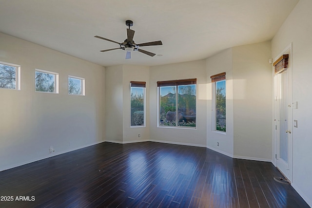5520 E Desert Forest Trl, Cave Creek, AZ 85331 - spare room with dark wood finished floors, a ceiling fan, and baseboards