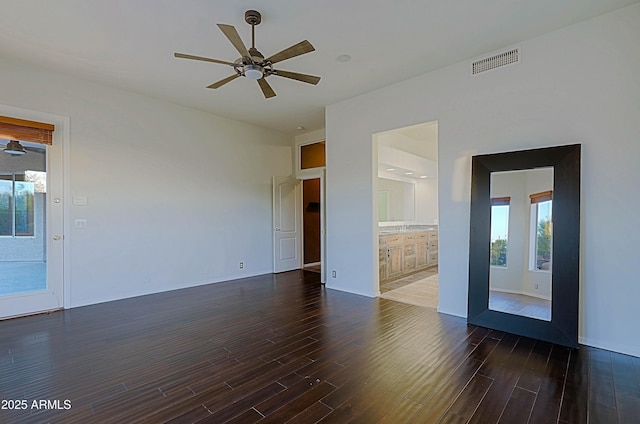 5520 E Desert Forest Trl, Cave Creek, AZ 85331 - spare room featuring wood finished floors, ceiling fan, and baseboards