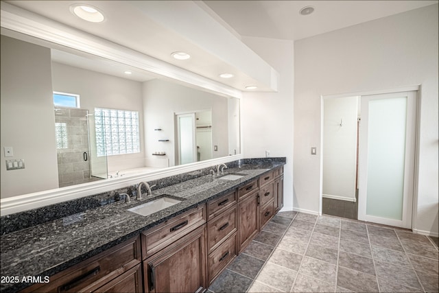 5520 E Desert Forest Trl, Cave Creek, AZ 85331 - full bathroom with a bath, a stall shower, double vanity, recessed lighting, and baseboards