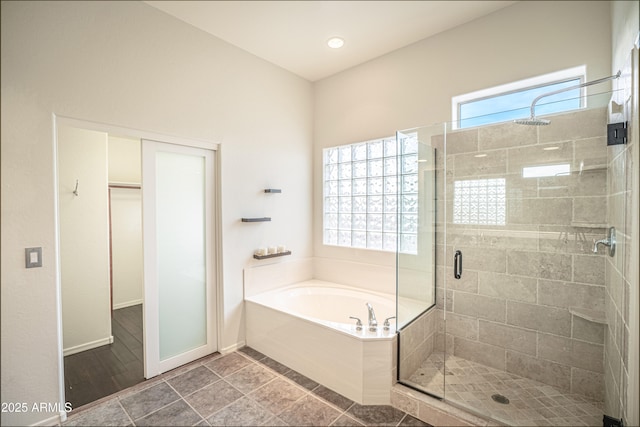5520 E Desert Forest Trl, Cave Creek, AZ 85331 - full bath featuring a shower stall, a bath, a spacious closet, and baseboards