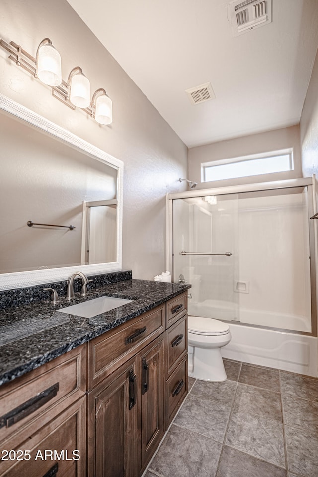 5520 E Desert Forest Trl, Cave Creek, AZ 85331 - bathroom with vanity, toilet, enclosed tub / shower combo, and tile patterned flooring