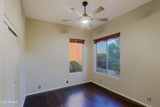 5520 E Desert Forest Trl, Cave Creek, AZ 85331 - empty room featuring dark wood-type flooring, baseboards, and ceiling fan
