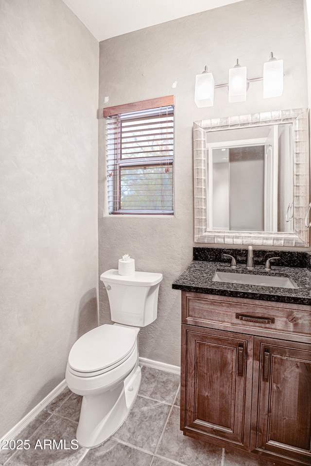 5520 E Desert Forest Trl, Cave Creek, AZ 85331 - half bathroom featuring toilet, vanity, baseboards, and tile patterned flooring