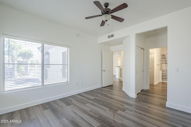 600 W Grove Pkwy Unit 2188, Tempe, AZ 85283 - unfurnished bedroom with wood finished floors and a ceiling fan