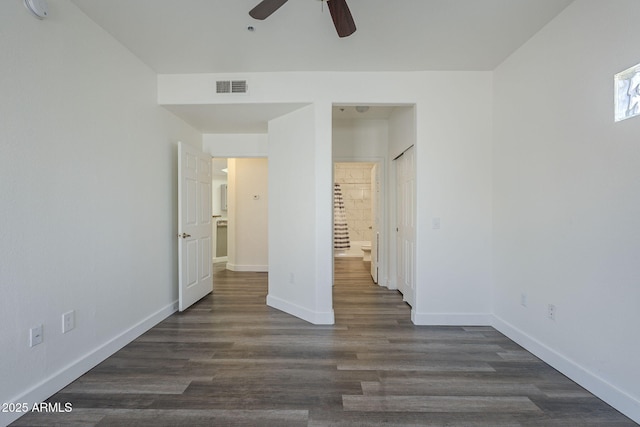 600 W Grove Pkwy Unit 2188, Tempe, AZ 85283 - unfurnished bedroom with dark wood-type flooring, ensuite bathroom, and ceiling fan