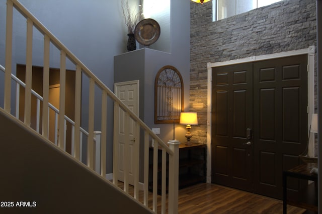 8920 S 40th Ln, Laveen, AZ 85339 - entryway featuring wood finished floors, a high ceiling, and stairs