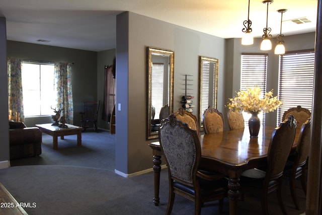 8920 S 40th Ln, Laveen, AZ 85339 - dining space with carpet, baseboards, and a chandelier