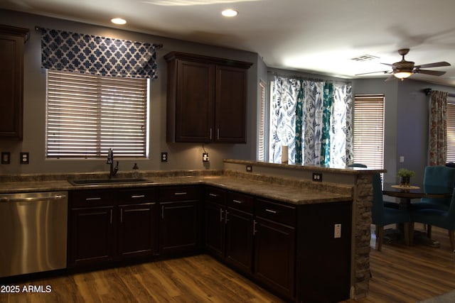 8920 S 40th Ln, Laveen, AZ 85339 - kitchen featuring stainless steel dishwasher, a sink, a peninsula, dark wood-style floors, and recessed lighting