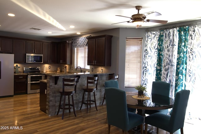 8920 S 40th Ln, Laveen, AZ 85339 - dining space with dark wood-type flooring, recessed lighting, and a ceiling fan