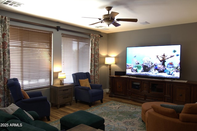 8920 S 40th Ln, Laveen, AZ 85339 - living area with light wood-style floors, a ceiling fan, and baseboards
