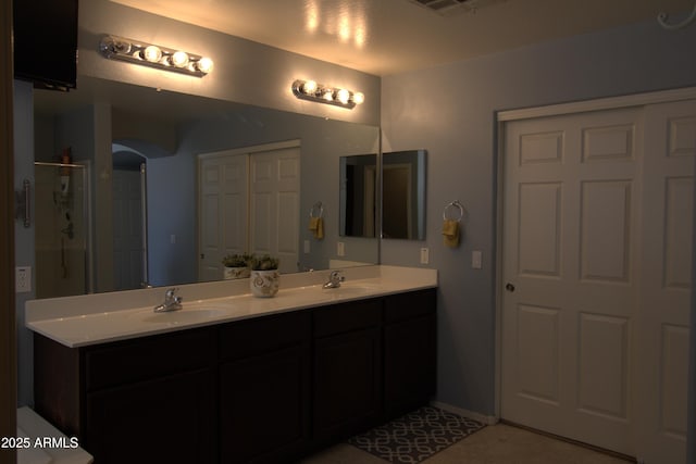 8920 S 40th Ln, Laveen, AZ 85339 - full bathroom featuring double vanity and a shower with door
