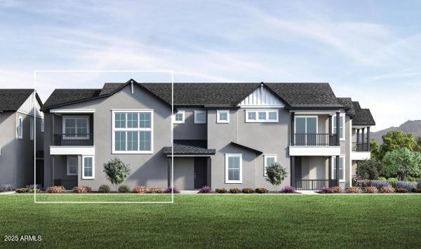 view of front of house featuring a shingled roof, a front yard, and stucco siding