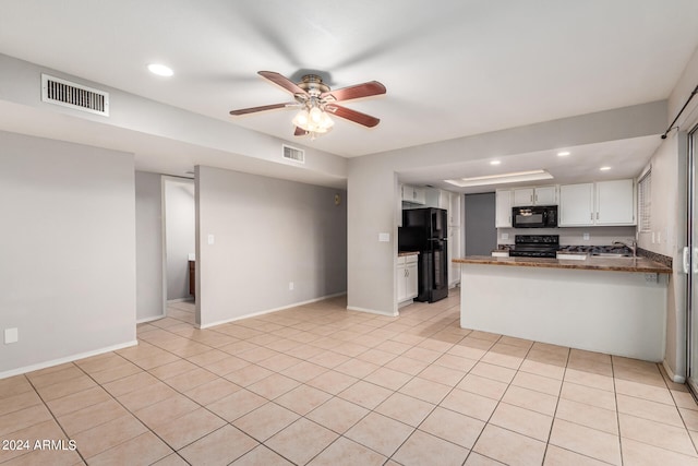 kitchen featuring kitchen peninsula, white cabinets, ceiling fan, black appliances, and sink