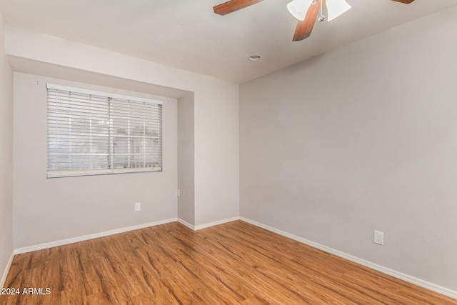 unfurnished room featuring light hardwood / wood-style floors and ceiling fan