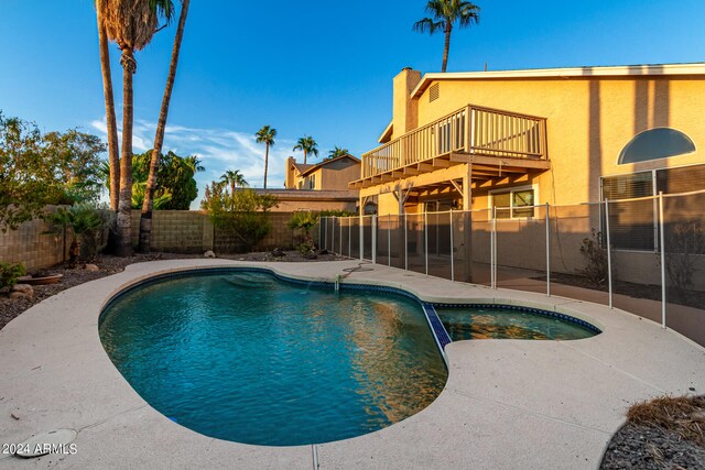 view of pool featuring a patio