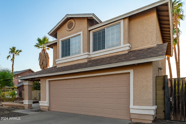 view of front of property featuring a garage