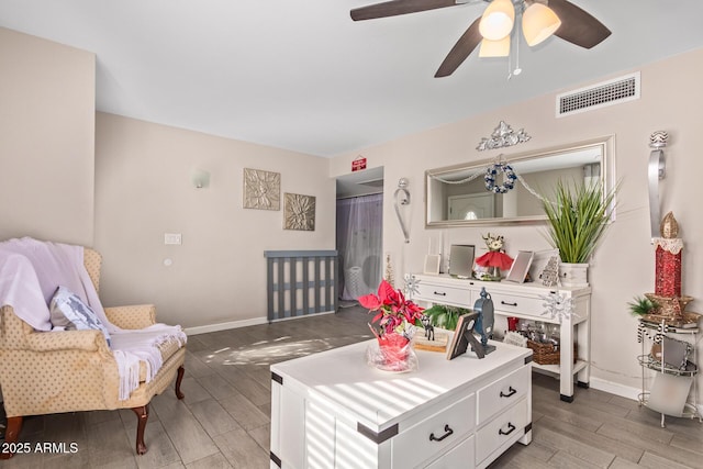 living room featuring ceiling fan