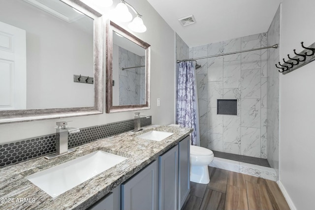 962 W Lindbergh Ave, Coolidge, AZ 85128 - bathroom featuring vanity, toilet, and walk in shower