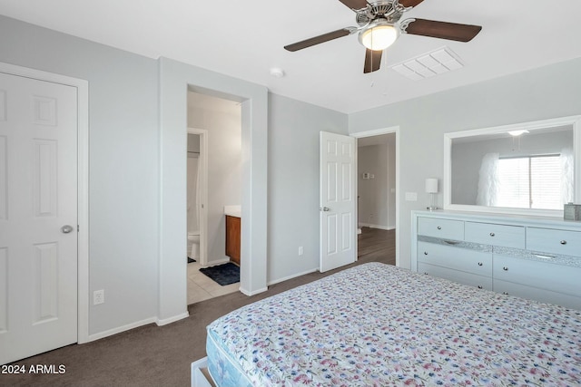 962 W Lindbergh Ave, Coolidge, AZ 85128 - bedroom with connected bathroom, ceiling fan, and carpet floors