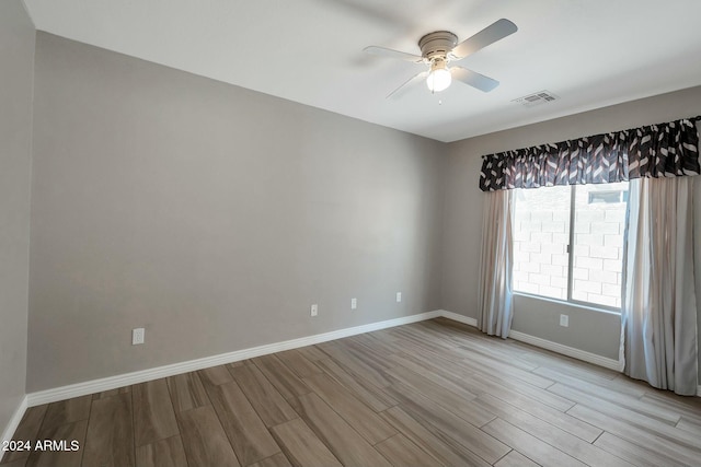 962 W Lindbergh Ave, Coolidge, AZ 85128 - unfurnished room featuring light hardwood / wood-style floors and ceiling fan