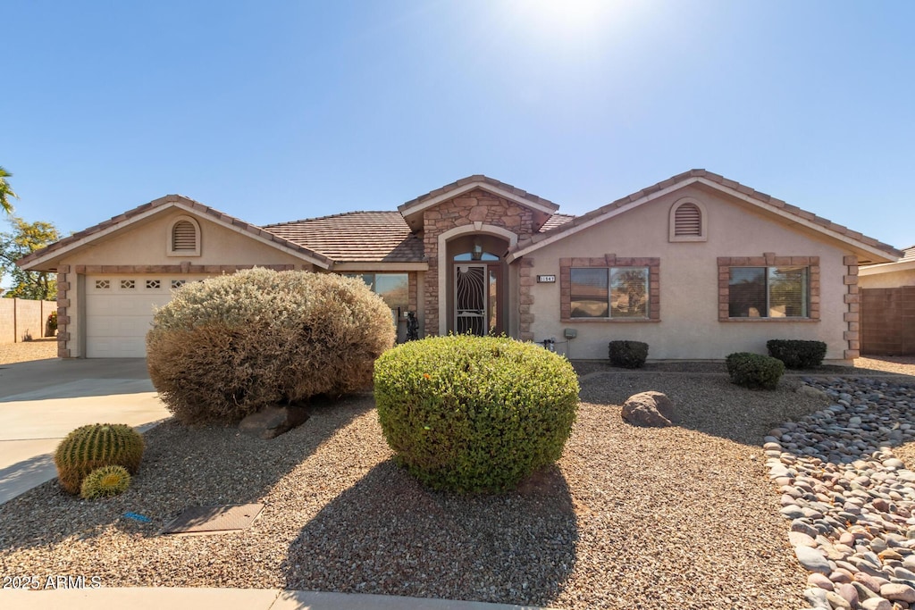 single story home featuring a garage