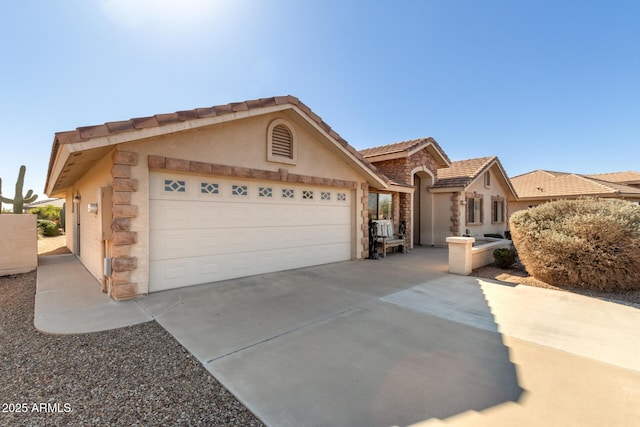 ranch-style home featuring a garage