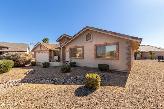 single story home with a garage