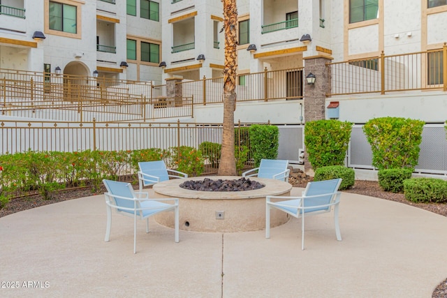 2511 W Queen Creek Rd Unit 378, Chandler, AZ 85248 - view of patio / terrace with an outdoor fire pit