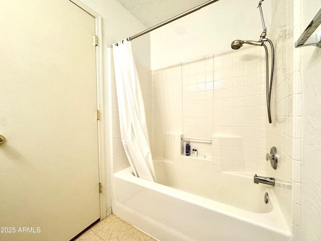 bathroom featuring tile patterned floors and shower / tub combo