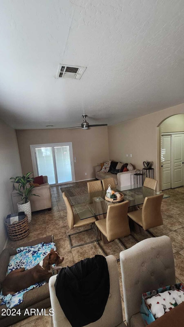 living room with a textured ceiling