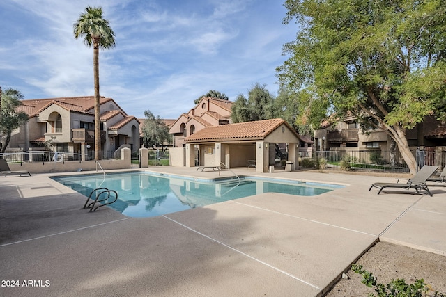 view of pool featuring a patio