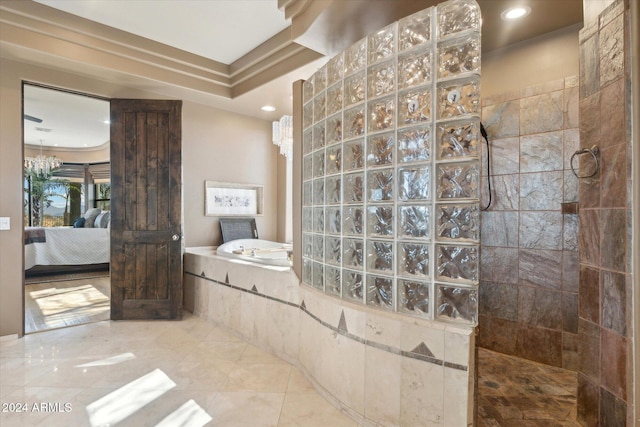 bathroom with crown molding, independent shower and bath, and an inviting chandelier